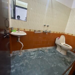 Bathroom in 2 BHK Builder Floor at Chattarpur – for Rent