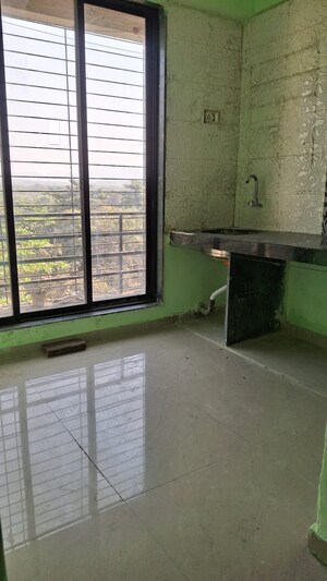 Kitchen in 2 BHK Apartment at Zorba KK Crystal, Ulwe – for Rent