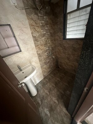 Bathroom in 1 BHK Apartment at Kothari Arunaren Residency, Kharadi – for Rent