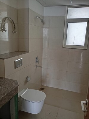 Bathroom in 2 BHK Apartment at Godrej Woods, Sector 43 – for Rent