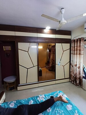 Living Room in 2 BHK Apartment at Lokhandwala Whispering Palms, Kandivali East – for Sale