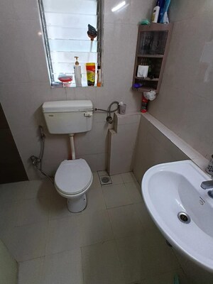 Bathroom in 2 BHK Apartment at Lokhandwala Whispering Palms, Kandivali East – for Sale