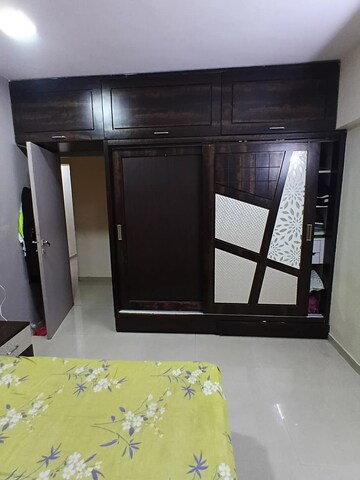 Room in 2 BHK Apartment at Lokhandwala Whispering Palms, Kandivali East – for Sale