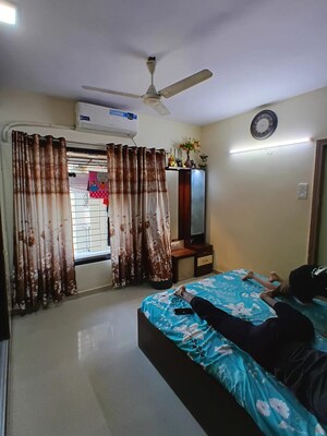 Bedroom in 2 BHK Apartment at Lokhandwala Whispering Palms, Kandivali East – for Sale