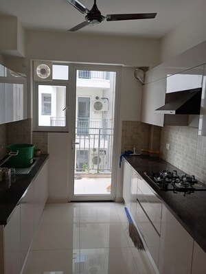 Kitchen in 3 BHK Apartment at Godrej Woods, Sector 43 – for Rent