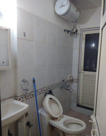Bathroom in 1 BHK Apartment at K Raheja Palm Court, Malad West – for Sale