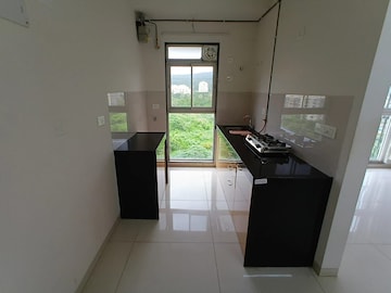 Kitchen in 1 BHK Apartment at Godrej Tranquil, Kandivali East – for Sale
