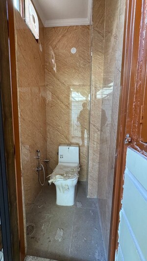 Bathroom in 2 BHK Builder Floor at Chattarpur – for Rent