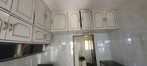 Kitchen in 2 BHK Apartment at Alica Nagar CHS, Kandivali East – for Sale