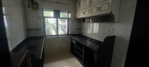Kitchen in 2 BHK Apartment at Alica Nagar CHS, Kandivali East – for Sale