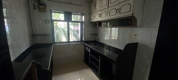 Kitchen in 2 BHK Apartment at Alica Nagar CHS, Kandivali East – for Sale