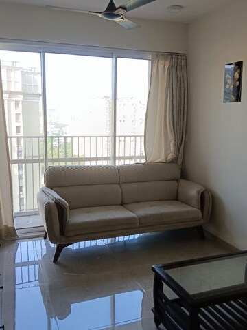 Living Room in 2 BHK Apartment at Heranadani Meadows Gemini, Ghodbunder Road – for Rent