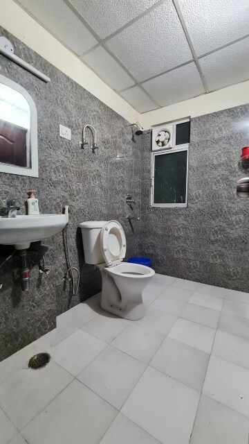Bathroom in 2 BHK Apartment at Nitishree Aura Chimera, Raj Nagar Extension – for Sale