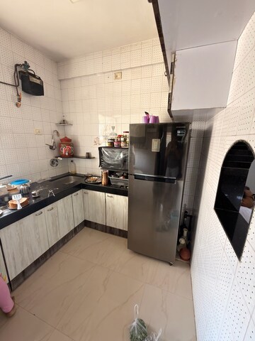 Kitchen in 1 BHK Apartment at Raheja Twp – for Rent