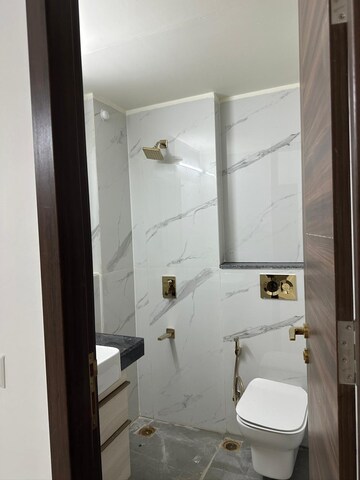 Bathroom in 3 BHK Apartment at Smart World Orchard, Sector 61 – for Sale