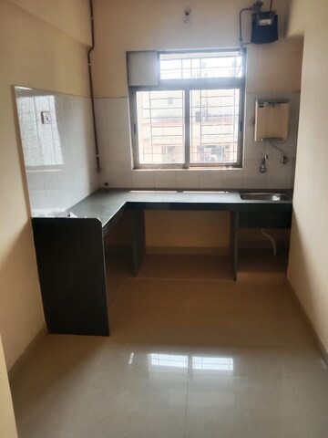 Kitchen in 2 BHK Apartment at Rutu Enclave, Kasarvadavali – for Rent