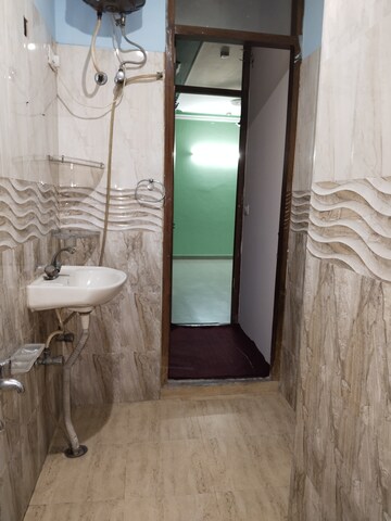 Bathroom in 2 BHK Apartment at Khirki Extension – for Rent
