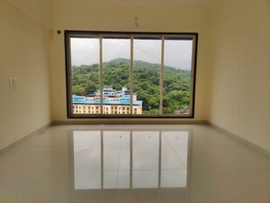 Room in 2 BHK Apartment at Lalani Residency, Kavesar – for Sale