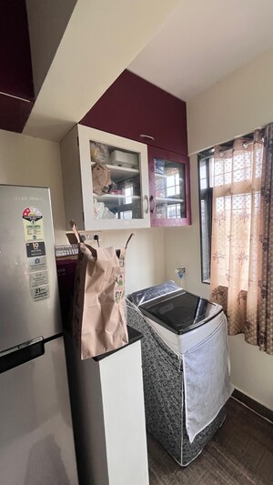 Kitchen in 1 BHK Apartment at Raj Heramba Venkatesh Imperia, Tathawade – for Rent