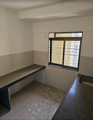 Room in 2 BHK Apartment at Acme Ozone, Manpada – for Sale