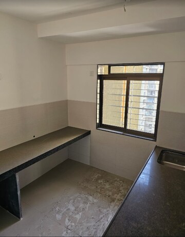 Room in 2 BHK Apartment at Acme Ozone, Manpada – for Sale