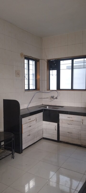 Kitchen in 2 BHK Apartment at Nirmiti Horizon, Aundh – for Rent