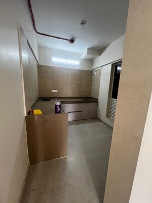 Kitchen in 2 BHK Apartment at Dosti West County, Balkum Pada – for Rent