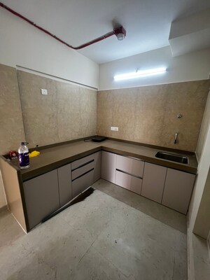 Kitchen in 2 BHK Apartment at Dosti West County, Balkum Pada – for Rent