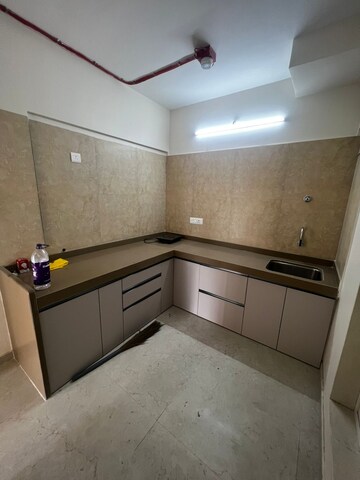 Kitchen in 2 BHK Apartment at Dosti West County, Balkum Pada – for Rent