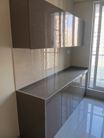 Kitchen in 2 BHK Apartment at Hiranandani Delanna, Ghodbunder Road – for Rent