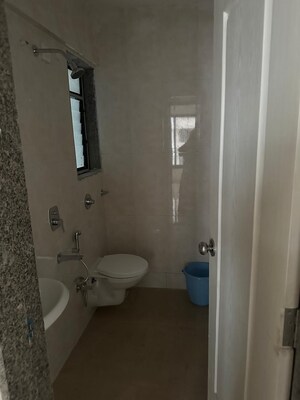 Bathroom in 2 BHK Apartment at BG Shirke Monte Verita, Borivali East – for Rent
