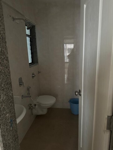 Bathroom in 2 BHK Apartment at BG Shirke Monte Verita, Borivali East – for Rent