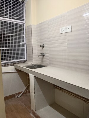 Kitchen in 1 RK Apartment at Khirki Extension – for Rent
