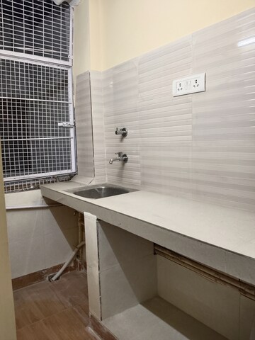 Kitchen in 1 RK Apartment at Khirki Extension – for Rent