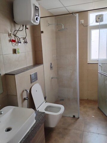 Bathroom in 3 BHK Apartment at Emaar Palm Gardens, Sector 83 – for Sale