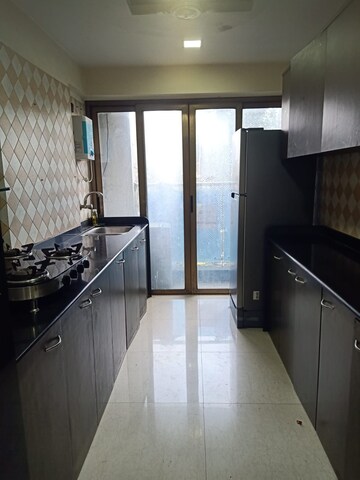 Kitchen in 3 BHK Apartment at Kalpataru Sparkle, Bandra East – for Rent