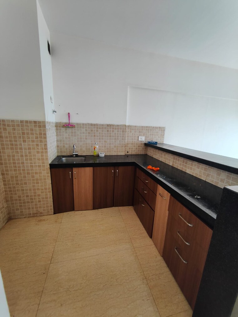 Kitchen, lodha-belmondo 1 Bedroom 711 Sq.Ft. Apartment In Gahunje Pune 9624756