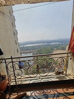 Balcony in 3 BHK Apartment at Tharwani Rosewood Heights, Kharghar Sector 10 – for Rent