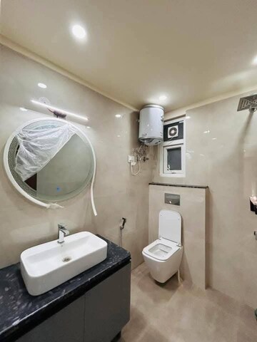 Bathroom in 2 BHK Apartment at Paryavaran Complex – for Rent
