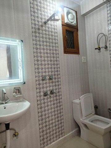 Bathroom in 3 BHK Apartment at Palam Colony – for Rent