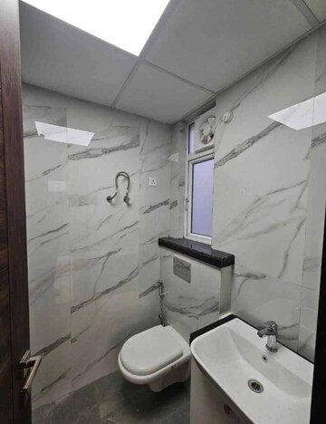Bathroom in 2.5 BHK Builder Floor at Smart World Gems, Sector 89 – for Sale