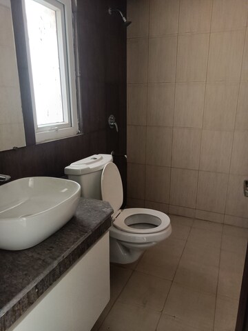 Bathroom in 3 BHK Apartment at Lotus Panache, Sector 110 – for Rent
