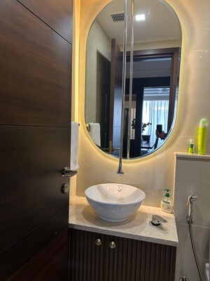Bathroom in 4 BHK Apartment at Vasant Vihar – for Rent