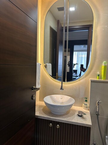 Bathroom in 4 BHK Apartment at Vasant Vihar – for Rent