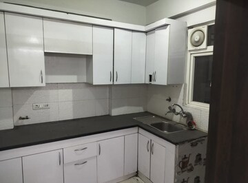 Kitchen in 3 BHK Apartment at Casa Woodstock, Sector 16c Greater Noida – for Sale