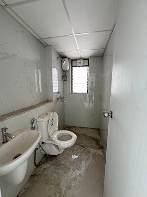 Bathroom in 3 BHK Apartment at Runwal Gardens Phase I, Dombivli East – for Rent