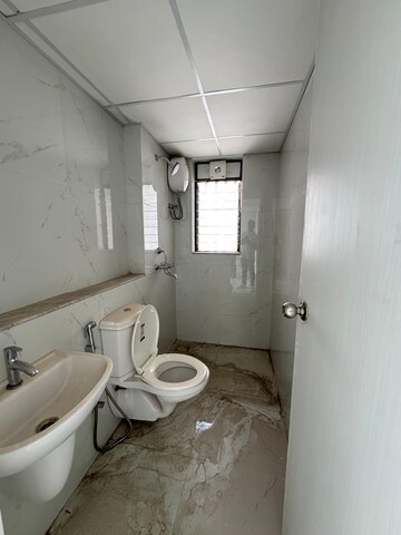 Bathroom in 3 BHK Apartment at Runwal Gardens Phase I, Dombivli East – for Rent