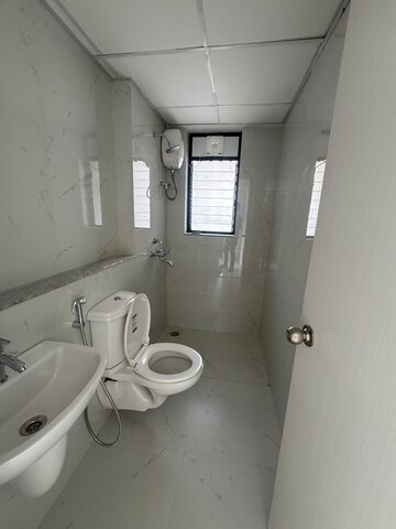 Bathroom in 3 BHK Apartment at Runwal Gardens Phase I, Dombivli East – for Sale