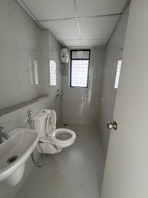 Bathroom in 3 BHK Apartment at Runwal Gardens Phase I, Dombivli East – for Rent