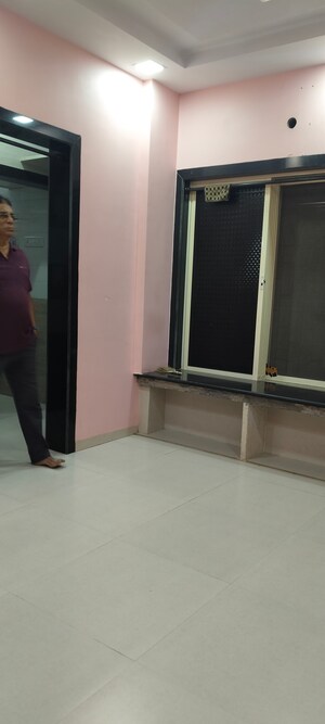 Room in 1 BHK Apartment at Shree Ashtavinayak CHS Seawoods, Seawoods – for Rent